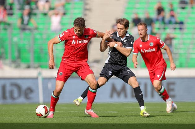 October 3, 2026, xtgx, soccer exhibition match, Hannover 96 vs. SC Verl, from left: Benedikt Pichler (Hannover), 11, Mika Clausen (Verl) – tackle, duel, battle, DFL DFB REGULATIONS PROHIBIT ANY USE OF PHOTOGRAPHS AS IMAGE SEQUENCES AND OR QUASI-VIDEO Hannover