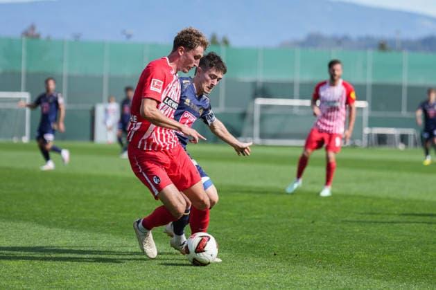 Friendly Match: SC Freiburg vs. FC Luzern, October 3, 2026. A tackle between Matteo di Giusto (FC Luzern, No. 11) and Patrick Osterhage (SC Freiburg, No. 6). Friendly Match: SC Freiburg vs. FC Luzern, Europa-Park Stadium, October 3, 2026 DFB and DFL regulations prohibit any use of photographs as image sequences and or quasi-video. Copyright: xBEAUTIFULxSPORTS Boscox