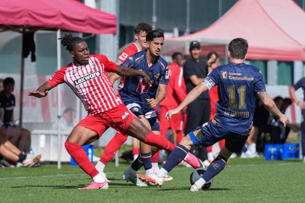 Cyriaque Irie (SC Freiburg), No. 22, in a tackle with Matteo Di Giusto (FC Lucerne), No. 11, Germany, soccer, friendly match, SC Freiburg vs. FC Lucerne, October 3, 2026, Europa-Park Stadium, Training Field, Freiburg, Europa-Park Stadium, Training Field, Baden-Württemberg, Germany Copyright: xArnexAmbergx