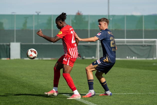 October 3, 2026, xjyhynx, Soccer Friendly Match, SC Freiburg vs. FC Lucerne, from left: Cyriaque Irià 22, SC Freiburg secures the ball against Loïc Lüthi 21, FC Lucerne vs. Freiburg