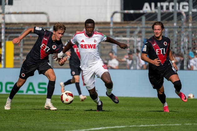 Tackle between Tim Kloss (Viktoria Cologne, 18) and Ragnar Ache (1. FC Cologne, 09), with Tobias Eisenhut (Viktoria Cologne) nearby, 06 FC Viktoria Cologne vs. FC Hansa Rostock, soccer, 3. Liga, Matchday 05, 2026–2027 season, September 11, 2026 DFL DFB regulations prohibit any use of photographs as image sequences and or quasi-video FC Viktoria Cologne vs. FC Hansa Rostock, soccer, 3. Liga, Matchday 5, 2026–2027 season, September 11, 2026, Cologne Copyright: xEibner-Pressefoto ThomasxHaeslerx EP_THR