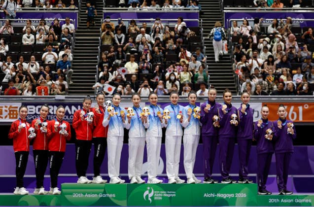 (261003) -- NAGOYA, Oct. 3, 2026 -- Gold medalist team China (C), silver medalist team Japan (L) and bronze medalist team Kazakhstan pose during the awarding ceremony for the Group All-Around of Rhythmic gymnastics, Rhythmische Sportgymnastik, RSG at 20th Asian Games Aichi-Nagoya 2026 in Nagoya, Japan, Oct. 3, 2026. ) (SP)JAPAN-NAGOYA-ASIAN GAMES-RHYTHMIC GYMNASTICS-GROUP ALL-AROUND-FINAL WuxZhizun 