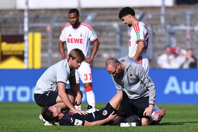 Soccer friendly match: FC Viktoria Köln vs. 1. FC Köln on October 3, 2026, at Sportpark Höhenberg in Cologne. Alexander Prokopenko (Cologne) lies injured on the ground. xRx