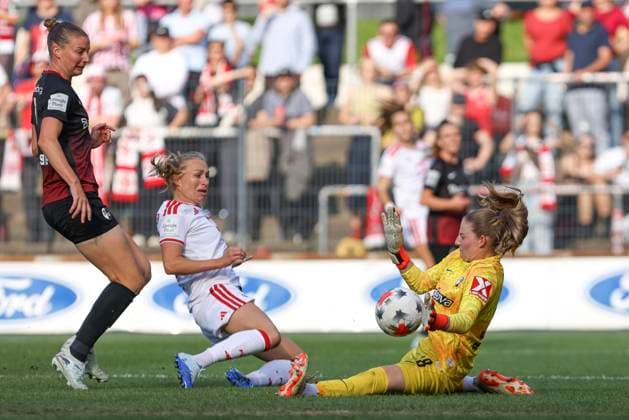 Julia Stierli of SC Freiburg, Pauline Bremer of 1. FC Köln, and goalkeeper Anna Reimann of SC Freiburg in a tackle during the Women s Bundesliga match between 1. FC Köln and SC Freiburg, Franz Kremer Stadium on October 3, 2026, in Cologne, Germany. Photo by Oliver Kaelke, DeFodi Images. Julia Stierli of SC Freiburg, Pauline Bremer of 1. FC Köln and goalkeeper Anna Reimann of SC Freiburg battle for the ball during the Bundesliga match between 1. FC Köln and SC Freiburg at Franz Kremer Stadium on October 3, 2026 in Cologne, Germany. Photo by Oliver Kaelke, DeFodi Images. DFB and DFL regulations prohibit any use of photographs as image sequences and or quasi-video. Photo by Oliver Kaelke, DeFodi Images.