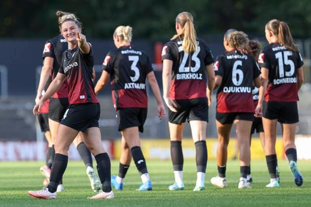 Carina Brunold of SC Freiburg celebrates the goal with her teammates after scoring the 0-1 goal during the Women s Bundesliga match between 1. FC Köln and SC Freiburg, Franz Kremer Stadium on October 3, 2026, in Cologne, Germany. Photo by Oliver Kaelke, DeFodi Images. Carina Brunold of SC Freiburg celebrates with her teammates after scoring her team’s first goal during the Bundesliga match between 1. FC Köln and SC Freiburg at Franz Kremer Stadium on October 3, 2026 in Cologne, Germany. Photo by Oliver Kaelke, DeFodi Images. DFB and DFL regulations prohibit any use of photographs as image sequences and or quasi-video. Photo by Oliver Kaelke, DeFodi Images.