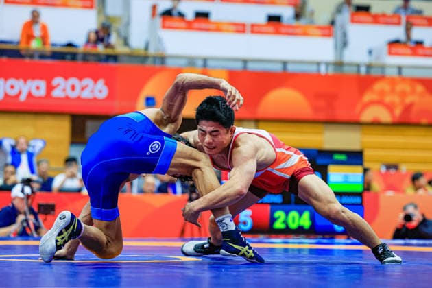 Asian Games, 57 kg Freestyle: Aman Aman (IND) def. Chongsong Han (PRK) Copyright: xAmirrezaxAliasgarix