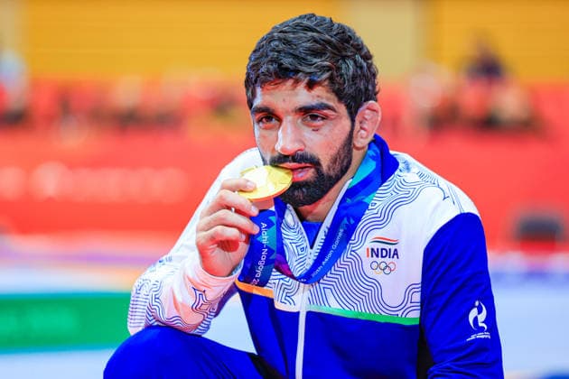 Asian Games Podium: 57kg Freestyle Gold – Aman Aman (IND) Copyright: xAmirrezaxAliasgarix