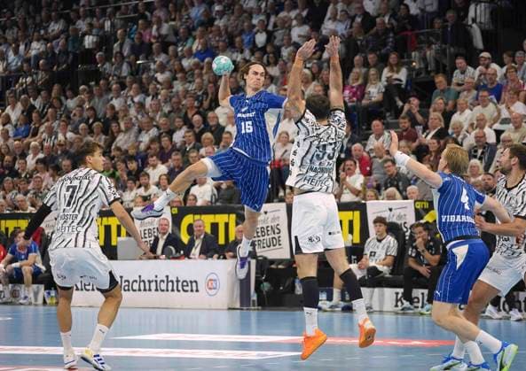 Photo: Miro Schluroff (Gummersbach) taking a shot against Veron Nacinovic (Kiel) – Men s Handball Bundesliga 1 on Sat, Oct 3, 2026, THW Kiel vs. VfL Gummersbach