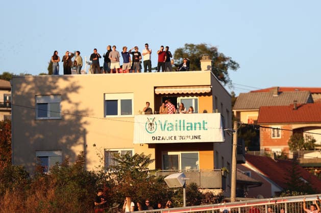 Rijeka, Croatia, 3rd October 2026. UEFA Nations League. Matchday 3, Group A3. Croatia v England at Rujevica, Rijeka. Croatian supporters at house roof Croatia v England, UEFA Nations League. 