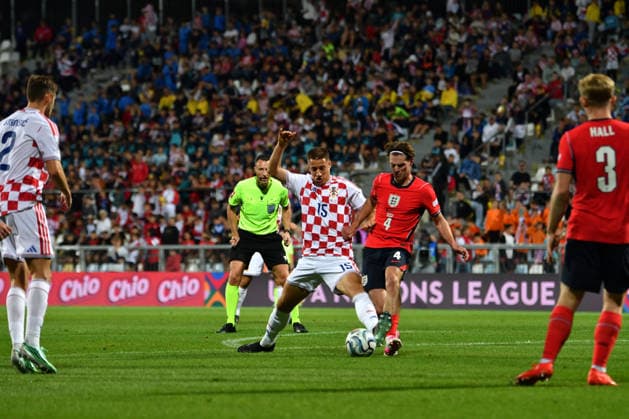 RIJEKA, CROATIA - OCTOBER 03: Mario Pasalic of Croatia (CL) in action against Alex Scott of England (CR) during the UEFA Nations League, League A Group A3, match between Croatia and England at Stadion Rujevica, Rijeka on October 03, 2026 in Rijeka, Croatia. (Photo by Natasa Kupljenik Sports Press Photo). Copyright: xNatasaxKupljenikx xSPPx Sportspressphoto_SPR244616