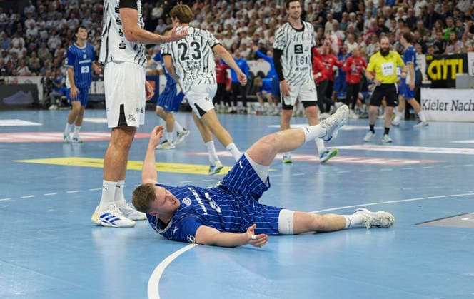 Photo: Kristjan Horzen, devastated on the floor. Gummersbach Men s Handball, Bundesliga 1, Sat, Oct 3, 2026: THW Kiel vs. VfL Gummersbach