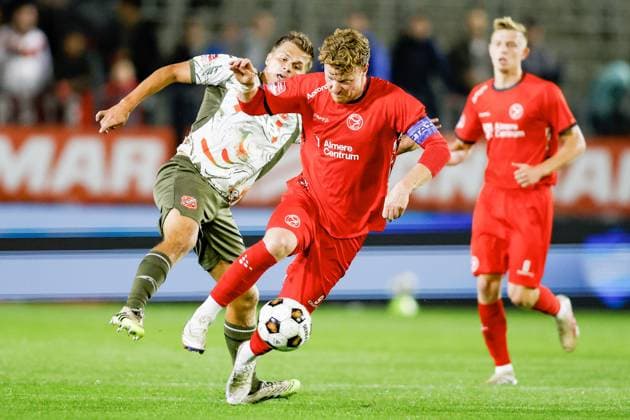 ALMERE , 03-10-2026 , Yanmar Stadium , season 2026 2027 , Dutch , Keukenkampioen division , match between 20:00 uur Almere City FC and FC Volendam , picture shows Almere City FC player Ferdy Druijf vs FC Volendam player Alex Plat Almere City - Volendam  x207865774x Copyright: