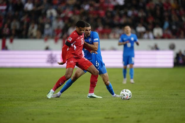 Luzern, Switzerland - October 03: Zachary Athekame (16 SUI) against Danijel Sturm (15 SLO) during the UEFA Nations League match between Switzerland and Slovenia at thermoplan arena on October 03, 2026 in Luzern, Switzerland. Copyright: xKjetilxWaberx xSPPx Sportspressphoto_SPR244726