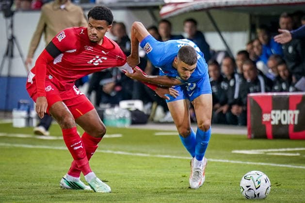 Soccer: UEFA Nations League 2026–2027, Matchday 3: Switzerland vs. Slovenia at Thermoplan Arena Lucerne—Zachary Athekame (Switzerland, 16) and Danijel Sturm (Slovenia, 15) in a tackle Copyright: xJOERANxSTEINSIEKx