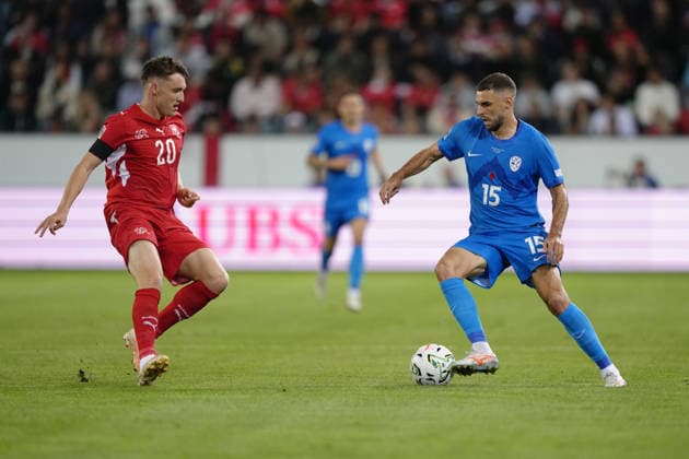 Luzern, Switzerland - October 03: Danijel Sturm (15 SLO) against Michel Aebischer (20 SUI) during the UEFA Nations League match between Switzerland and Slovenia at thermoplan arena on October 03, 2026 in Luzern, Switzerland. Copyright: xKjetilxWaberx xSPPx Sportspressphoto_SPR244735