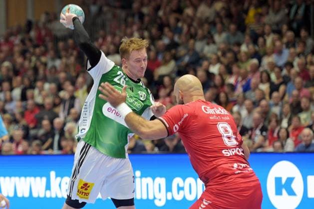 Jonathan Edvardsson (TSV Hannover Burgdorf 26) takes a shot; Adrian Sipos (MT Melsungen 8), GER, MT Melsungen vs. TSV Hannover Burgdorf, handball, 1st Bundesliga, Matchday 7, 2026–2027 season, October 3, 2026, GER, MT Melsungen vs. Hannover Burgdorf, Handball, 1st Bundesliga, Matchday 7, 2026–2027 season, October 3, 2026, Kassel Copyright: xEibner-Pressefotox xRolandxSippelx EP_RSL