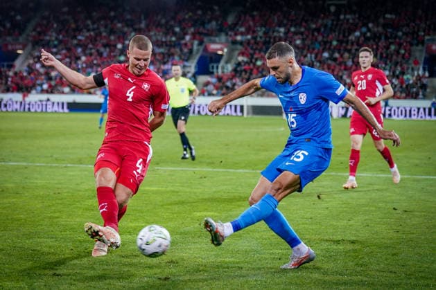 Soccer: UEFA Nations League 2026–2027, Matchday 3: Switzerland vs. Slovenia at Thermoplan Arena Lucerne; Nico Elvedi (Switzerland), 4; Danijel Sturm (Slovenia), 15 Copyright: xJOERANxSTEINSIEKx