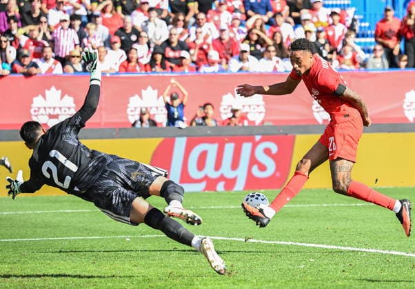 October 3, 2026, Montreal, Pq, Canada: Peru goalkeeper Diego Romero (21) closes down Canada s Daniel Jebbison (26) during first half International Friendly, Länderspiel, Nationalmannschaft soccer action in Montreal, on Saturday, Oct. 3, 2026. Canada News - October 3, 2026 - ZUMAc35_ 20261003_zaf_c35_033 Copyright: xGrahamxHughesx