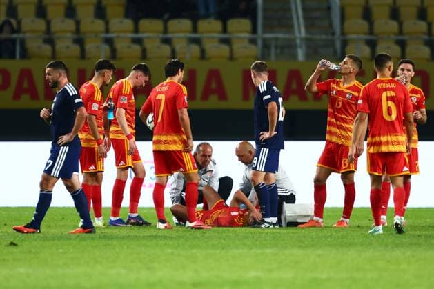 Agon Elezi of North Macedonia receives medical attention after being fouled by Scott McKenna of Scotland. North Macedonia v Scotland, UEFA Nations League, Football, Nacionalna Arena Tose Proeski, Skopje, North Macedonia - 03 Oct 2026Skopje Nacionalna Arena Tose Proeski North Macedonia  Copyright: xNikolaxKrstic Shutterstockx 17184131fy