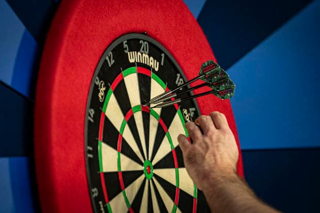 RECORD DATE NOT STATED 3rd October 2026; Mattioli Arena, Leicester, England; PDC World Grand Prix Darts Day 6; Luke Humphries collects his darts after hitting another 180 GodfreyxPitt