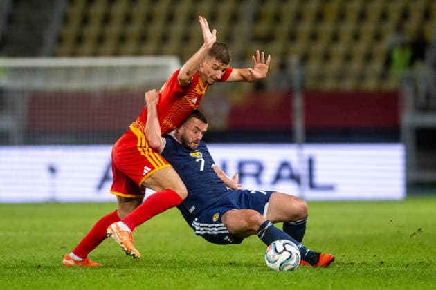 Luka Stankovski John McGinn seen during UEFA Nations League Division B game between National Teams of North Macedonia an Scotland (Jacek Prondzynski Ball Raw Images) Skopje North Macedonia, Skopje North Macedonia Copyright: xJacekxProndzynskix jacekprondzynski_northmacedonia_scotland_2627_086