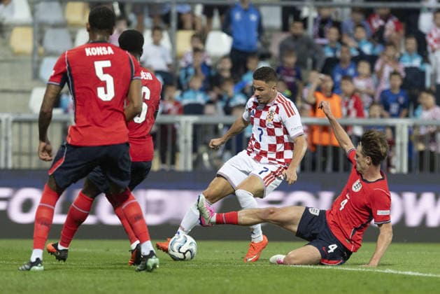 Croatia v England - UEFA Nations League RIJEKA, CROATIA - OCTOBER 03: Franjo Ivanovic (7) of Croatia in action against Alex Scot (4) of England during UEFA Nations League, League A, Group A3 soccer match at Stadion HNK Rijeka in Rijeka, Croatia on October 03, 2026. Stringer Anadolu Grad Zagreb Croatia. Editorial use only. Please get in touch for any other usage.  Copyright: x2026xAnadoluxStringerx