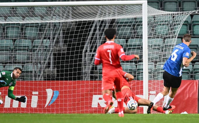 (261004) -- TALLINN, Oct. 4, 2026 -- Estonia s Rasmus Peetson (R) scores the opening goal during the 2026 27 UEFA Nations League C Group C4 football match between Estonia and Luxembourg at A. Le Coq Arena in Tallinn, Estonia, Oct. 3, 2026. (Photo by Xinhua) (SP)ESTONIA-TALLINN-FOOTBALL-UEFA NATIONS LEAGUE C-ESTONIA VS LUXEMBOURG SergeixStepanov 