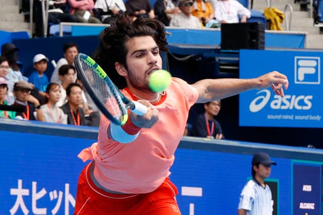 October 4, 2026, Tokyo, Japan: Carlos Alcaraz (Spain) returns a shot against Denis Shapovalov (Canada) during their quarterfinal match at the Kinoshita Group Japan Open Tennis Championships at Ariake Colosseum in Tokyo. Shapovalov suffered an injury, forcing him to retire early in the second set. The tournament runs from September 29 to October 6. Alcaraz won 7-6(3), 2-1 Tokyo Japan - ZUMAm191 20261004_aap_m191_065 Copyright: xRodrigoxReyesxMarinx