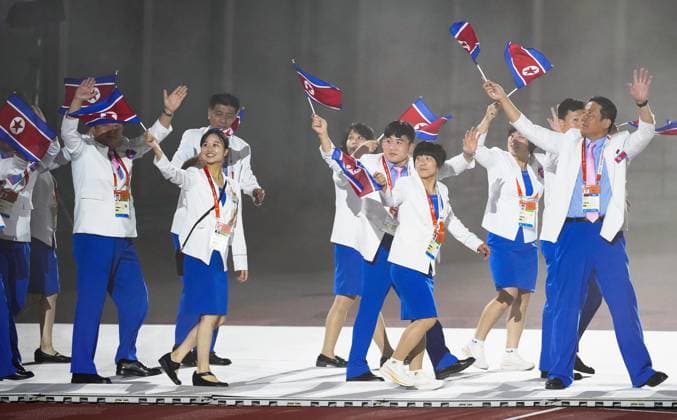 Aichi-Nagoya Asian Games: Closing ceremony North Korean athletes march during the closing ceremony of the Aichi-Nagoya Asian Games at Mizuho Park Athletic Stadium in Nagoya, central Japan, on Oct. 4, 2026.  A14AA0005629995P