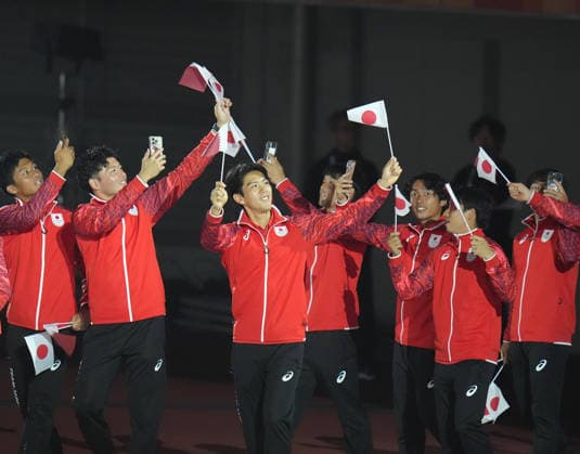(261004) -- NAGOYA, Oct. 4, 2026 -- Delegation of Japan wave to spectators during the closing ceremony of the 20th Asian Games Aichi-Nagoya 2026 in Nagoya, Japan, Oct. 4, 2026. ) (SP)JAPAN-NAGOYA-ASIAN GAMES-CLOSING CEREMONY WangxFei 