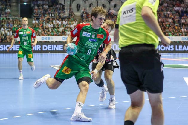 October 4, 2026, xgox, Handball: Opel HBL SC Magdeburg vs. HC Erlangen, emspor, from left: Oskar Vind Rasmussen (Magdeburg), 9, Christopher Bissel (Erlangen), 21; duel, battle, tackle, Magdeburg