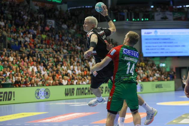 October 4, 2026, xtgx, Opel HBL Handball, SC Magdeburg vs. HC Erlangen emspor, from left: Lars Genz (Erlangen), 3, Omar Ingi Magnusson (Magdeburg), 14; duel, battle, tackle (Magdeburg)
