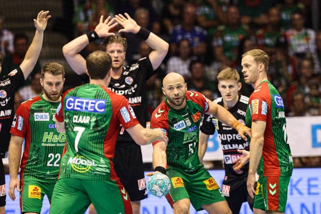 Oscar Bergendahl (M), SC Magdeburg, 54, with Omar Ingi Magnusson (R), SC Magdeburg, 14, and Felix Claar, SC Magdeburg, 7. Handball Bundesliga Season 2026–2027: SC Magdeburg vs. HC Erlangen at the GETEC Arena in Magdeburg. Action,Handball, Germany, October 4, 2026
