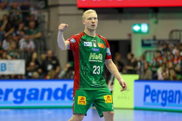 October 4, 2026, xgox, Handball Opel HBL SC Magdeburg vs. HC Erlangen emspor, from left: Magnus Saugstrup (Magdeburg), 23, cheering, goal celebration, celebrating the goal, Magdeburg celebration