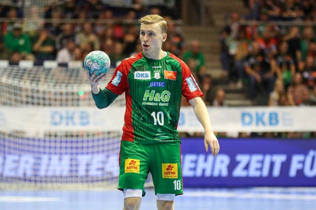 October 4, 2026, xgox, Handball: Opel HBL SC Magdeburg vs. HC Erlangen emspor, from left: Gisli, Thorgeir, Kristjansson (Magdeburg), 10 with the ball, plays the ball (Magdeburg)
