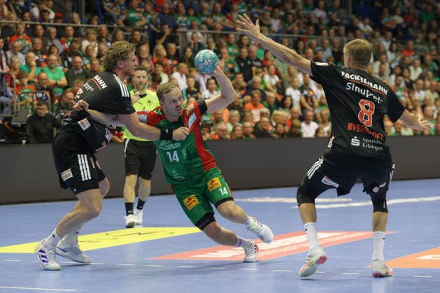 October 4, 2026, xtgx, Opel HBL Handball, SC Magdeburg vs. HC Erlangen emspor, from left: Maciej Gebala (Erlangen), 77, Omar Ingi Magnusson (Magdeburg), 14; duel, battle, tackle (Magdeburg)