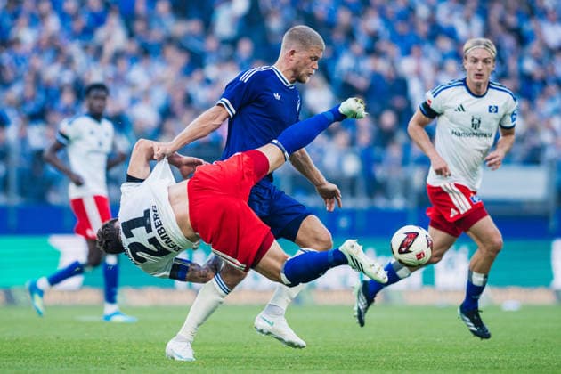 Friendly Match: Hamburger SV vs. FC Copenhagen, October 4, 2026: Nicolai Remberg of Hamburger SV (No. 21) battles Andreas Cornelius of FC Copenhagen (No. 14) in a soccer match. Friendly match between Hamburger SV and FC Copenhagen on October 4, 2026, at the Volksparkstadion, Hamburg DFL REGULATIONS PROHIBIT ANY USE OF PHOTOGRAPHS AS IMAGE SEQUENCES AND OR QUASI-VIDEO Copyright: xBEAUTIFULxSPORTS Tonhäuserx