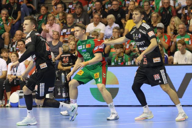 October 4, 2026, xtgx, Opel HBL Handball, SC Magdeburg vs. HC Erlangen, from left: Malte Elze (Magdeburg), 4, Tim Gömmel (Erlangen), 95, one-on-one, duel, battle, tackle, Magdeburg