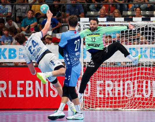 October 4, 2026, Germany, Stuttgart, Opel HBL, 2026–2027 Bundesliga, TVB Stuttgart vs. TBV Lemgo Lippe, from left: Joël Willecke (TBV), Philipp Meyer (TVB), Mohamed Essam Moustafa El Tayar (TVB)