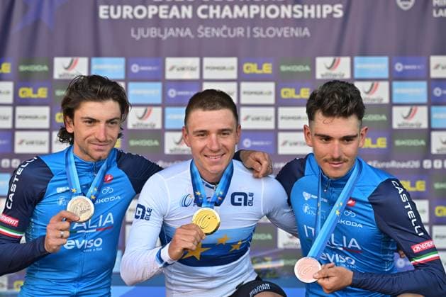 Italy s Giulio Ciccone; Belgium s Remco Evenepoel and Italy s Christian Scaroni celebrate on the podium after the elite men Road Race race (196,2 km) at the cycling UEC Road European Championships, in Ljubljana, Slovenia Sunday 4 October 2026. The UEC Road European Championships are taking place from 02 to 07 October in Ljubljana, Slovenia. DAVIDxPINTENS  x188709199x