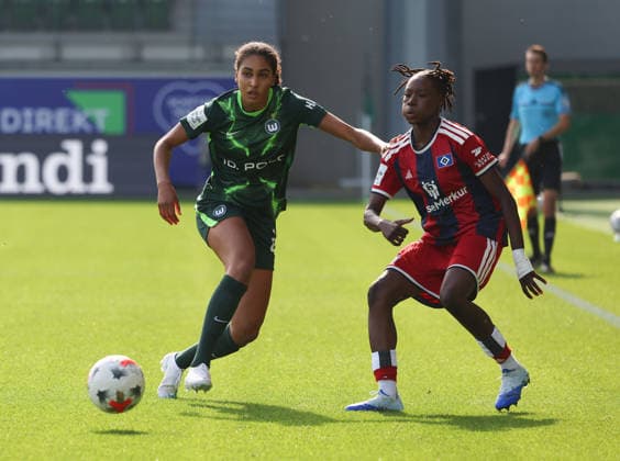 VfL vs. HSV, Women s Bundesliga, Wolfsburg, October 4, 2026, Soccer, Women, Google Pixel Bundesliga, 2026–2027 Season, VfL Wolfsburg vs. Hamburger SV, Cora Zicai (VfL Wolfsburg), Magou Doucoure (HSV), AOK Stadium, Lower Saxony, Germany