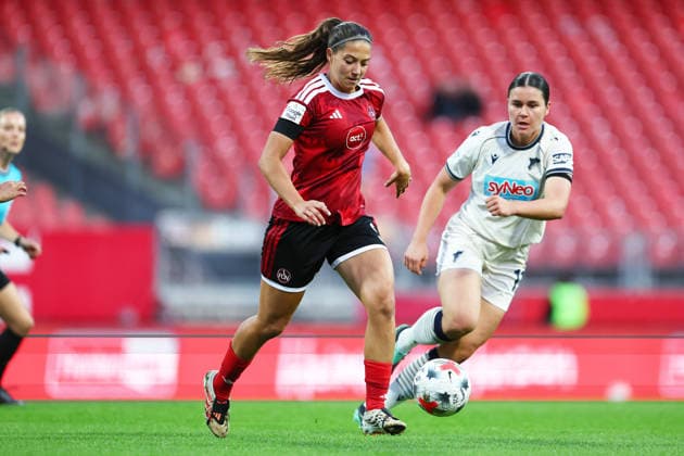 Football Women german Bundesliga 2026 - 2027 1.FC Nurnberg-TSG Hoffenheim Miller Laura of FCN ( L ) and Folmli Svenja of Hoffenheim ( R ) fight for the ball during the Women German Bundesliga 2026 - 2027 football match between 1.FC Nurnberg and TSG Hoffenheim at Max Morlock Stadium in Nuremberg , Bayern , Germany . October 04th , 2026 Photo by Davide Elias Copyright: xDavidexEliasx