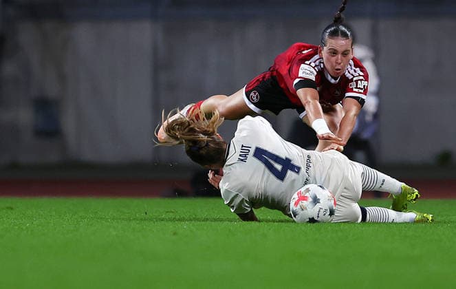 October 4, 2026, Nuremberg, Bayern, Germany: Kaut Lisann of Hoffenheim ( L ) and Brengel Jonna of FCN ( R ) fight for the ball during the Women German Bundesliga 2026 - 2027 football match between 1.FC Nurnberg and TSG Hoffenheim at Max Morlock Stadium in Nuremberg , Bayern , Germany . October 04th , 2026 Nuremberg Germany - ZUMAe140 20261004_zip_e140_058 Copyright: xDavidexEliasx