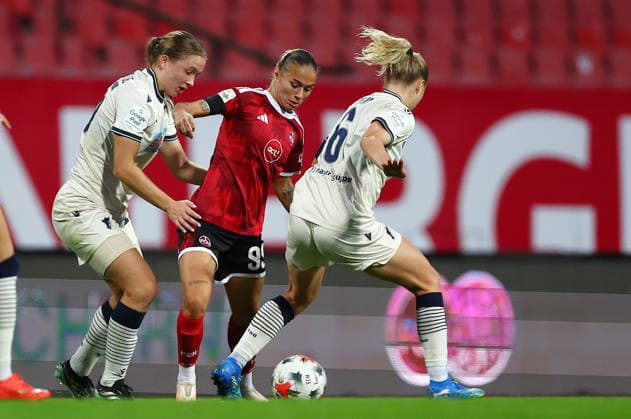 October 4, 2026, Nuremberg, Bayern, Germany: van de Velde Jonna of Hoffenheim ( L ) , Lapassouse Louna of FCN ( Middle ) and Diehm Vanessa of Hoffenheim ( R ) fight for the ball during the Women German Bundesliga 2026 - 2027 football match between 1.FC Nurnberg and TSG Hoffenheim at Max Morlock Stadium in Nuremberg , Bayern , Germany . October 04th , 2026 Football Women German Bundesliga 2026 - 2027 1.FC Nurnberg-TSG Hoffenheim  - ZUMAe140 20261004_zip_e140_055 Copyright: xDavidexEliasx
