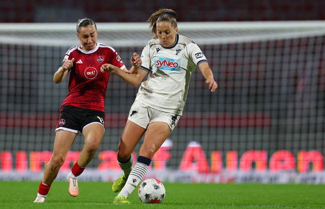 Football Women german Bundesliga 2026 - 2027 1.FC Nurnberg-TSG Hoffenheim Meroni Lara of FCN ( L ) and Kaut Lisann of Hoffenheim ( R ) fight for the ball during the Women German Bundesliga 2026 - 2027 football match between 1.FC Nurnberg and TSG Hoffenheim at Max Morlock Stadium in Nuremberg , Bayern , Germany . October 04th , 2026 Photo by Davide Elias Copyright: xDavidexEliasx
