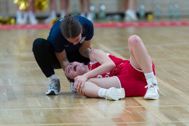 Nicole Brochlitz (Lions), No. 6, is lying on the floor injured during the Lions vs. TK Hannover Luchse game, women s basketball, 1st Bundesliga, DBBL, Matchday 1 of the 2026–27 season, April 10, 2026, at the SWH Arena in Halle, Saxony-Anhalt, Germany