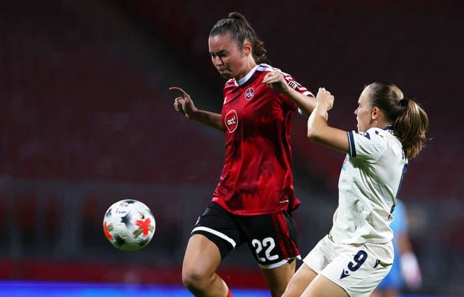 Football Women german Bundesliga 2026 - 2027 1.FC Nurnberg-TSG Hoffenheim Pollak Julia of FCN ( L ) and Steiner Marie of Hoffenheim ( R ) fight for the ball during the Women German Bundesliga 2026 - 2027 football match between 1.FC Nurnberg and TSG Hoffenheim at Max Morlock Stadium in Nuremberg , Bayern , Germany . October 04th , 2026 Photo by Davide Elias Copyright: xDavidexEliasx