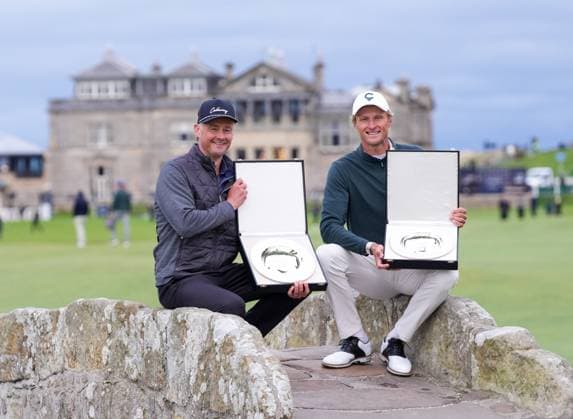 Team Champion golfers Tom Chaplin (amateur) & Adrian Meronk pose on the Swilken Bridge with the Alfred Dunhill Links Championship Team trophies. Alfred Dunhill Links Championship, Golf, Round 4, Old Course St Andrews, Scotland, UK, Scotland, UK - 04 Oct 2026 Scotland United Kingdom  Copyright: xStuartxWallace Shutterstockx 17185560e