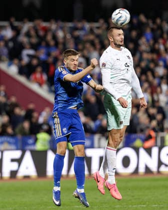 SOCCER - NL, KOS vs AUT PRISTINA,KOSOVO,04.OCT.26 - SOCCER - UEFA Nations League, OEFB international match, Länderspiel, Nationalmannschaft Kosovo vs Austria. Image shows Albion Rrahmani (KOS) and Sasa Kalajdzic (AUT).  GEPAxpictures xArminxRauthner