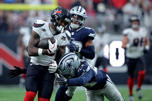 October 4, 2026, Houston, Texas, U.S: Houston Texans wide receiver Nico Collins (12) is tackled by Dallas Cowboys safety Malik Hooker (24) after a catch during the first quarter of the NFL, American Football Herren, USA regular season game between the Houston Texans and the Dallas Cowboys at Reliant Stadium in Houston, TX on October 4, 2026. Houston U.S - ZUMAw137 20261004_aap_w137_035 Copyright: xErikxWilliamsx